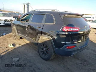 2015 Jeep Cherokee Latitude with VIN 1C4PJMCS0FW745949, listed as a IAAI auction lot 41289847 with 137,440 mi miles and . Bid and sale history available at carsss.com. Image 3.