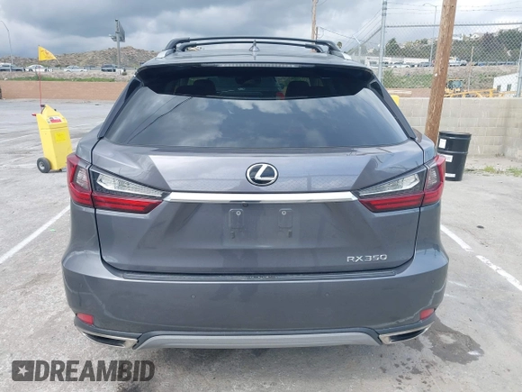 2020 Lexus RX with VIN 2T2HZMAA3LC153100, listed as a IAAI auction lot 41925188 with 104,216 mi miles. Bid and sale history available at carsss.com. Image 16.