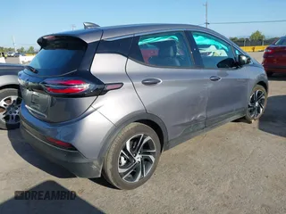 2023 Chevrolet Bolt EV 2LT z VIN 1G1FX6S05P4201698, wystawiony jako IAAI lot #41999199 z przebiegiem 5293 mil mil oraz . Historia ofert i sprzedaży dostępna na DreamBid. Obrazek 4.