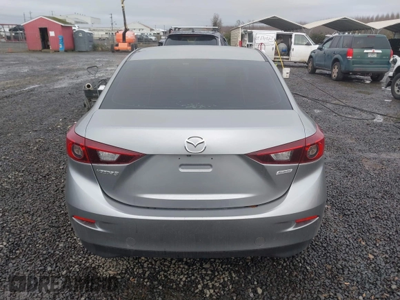 2016 Mazda Mazda3 i Sport with VIN 3MZBM1U76GM306988, listed as a IAAI auction lot 41286055 with 116,175 mi miles. Bid and sale history available at carsss.com. Image 17.