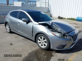 2015 Mazda 3 i Touring with VIN 3MZBM1L75FM224525, listed as a IAAI auction lot 41692928 with 57,803 mi miles. Bid and sale history available at carsss.com. Image 1.
