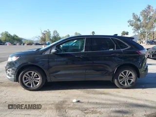 2015 Ford Edge SEL with VIN 2FMTK3J85FBB34115, listed as a IAAI auction lot 41813644 with 143,099 mi miles. Bid and sale history available at carsss.com. Image 14.