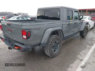 2022 Jeep Gladiator Mojave z VIN 1C6JJTEG8NL130971, wystawiony jako IAAI lot #41163074 z przebiegiem 47 142 mil mil oraz . Historia ofert i sprzedaży dostępna na DreamBid. Obrazek 4.