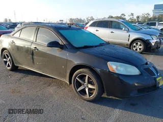 2009 Pontiac G6 1SA z VIN 1G2ZG57B494188877, wystawiony jako IAAI lot #42223003 z przebiegiem 227 590 mil mil oraz . Historia ofert i sprzedaży dostępna na DreamBid. Obrazek 1.