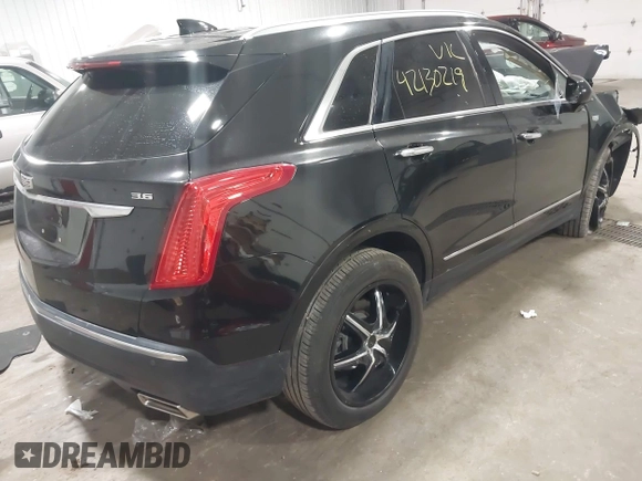 2018 Cadillac XT5 Premium Luxury FWD with VIN 1GYKNERS6JZ230175, listed as a IAAI auction lot 42130219 with 90,601 mi miles and . Bid and sale history available at DreamBid. Image 4.