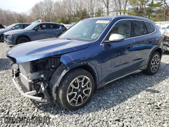 2023 BMW X1 xDrive28i with VIN WBX73EF05P5Y21721, listed as a Copart auction lot 50749295 with 10,633 mi miles and Salvage title. Bid and sale history available at DreamBid. Image 1.