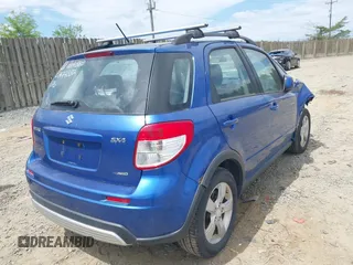 2012 Suzuki SX4 Crossover with VIN JS2YB5A3XC6308609, listed as a IAAI auction lot 42038325 with 165,399 mi miles. Bid and sale history available at carsss.com. Image 4.