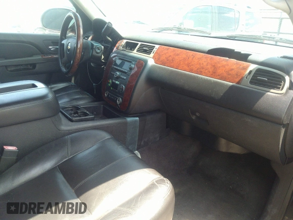 2013 Chevrolet Suburban LT with VIN 1GNSCJE05DR142688, listed as a IAAI auction lot 42214548 with 236,464 mi miles and . Bid and sale history available at DreamBid. Image 5.