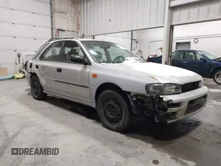 1999 Subaru Impreza L with VIN JF1GF4357XH811307, listed as a IAAI auction lot 41505426 with 195,693 mi miles and . Bid and sale history available at DreamBid. Image 1.