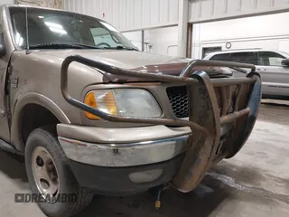 2001 Ford F-150 XL z VIN 1FTRX18W91NB49304, wystawiony jako IAAI lot #42316935 z przebiegiem 258 410 mil mil oraz . Historia ofert i sprzedaży dostępna na DreamBid. Obrazek 6.