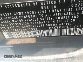 2014 Volkswagen Jetta SE z VIN 3VWD17AJ1EM412833, wystawiony jako IAAI lot #42351497 z przebiegiem 106 705 mil mil oraz . Historia ofert i sprzedaży dostępna na DreamBid. Obrazek 9.