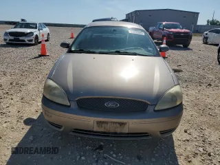 2004 Ford Taurus SE with VIN 1FAFP53U04A141688, listed as a Copart auction lot 55606685 with 134,548 mi miles and Salvage Title. Bid and sale history available at DreamBid. Image 5.