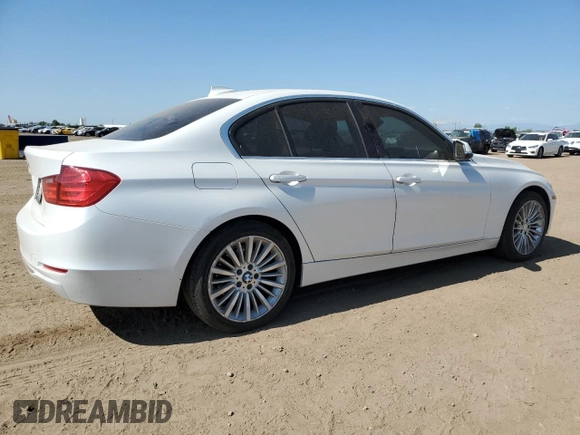 2013 BMW 3 Series 328i xDrive with VIN WBA3B3C51DF532714, listed as a Copart auction lot 57854735 with 140,650 mi miles and Salvage title. Bid and sale history available at DreamBid. Image 3.