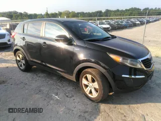2013 Kia Sportage LX with VIN KNDPBCA26D7409420, listed as a IAAI auction lot 42690140 with 150,386 mi miles and . Bid and sale history available at DreamBid. Image 1.