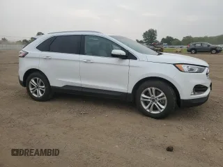 2020 Ford Edge SEL z VIN 2FMPK4J95LBB21392, wystawiony jako Copart lot #60912275 z przebiegiem 82 527 mil mil oraz Szkoda całkowita • Salvage title. Historia ofert i sprzedaży dostępna na DreamBid. Obrazek 4.