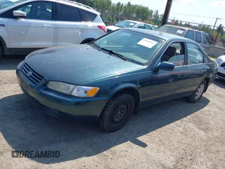 1997 Toyota Camry LE with VIN JT2BG22K5V0073783, listed as a IAAI auction lot 42409561 with 149,560 mi miles and . Bid and sale history available at DreamBid. Image 2.