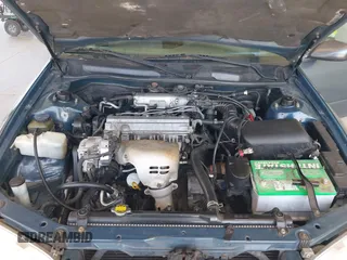 2000 Toyota Camry CE z VIN JT2BG22KXY0406984, wystawiony jako IAAI lot #42344436 z przebiegiem 234 729 mil mil oraz . Historia ofert i sprzedaży dostępna na DreamBid. Obrazek 10.