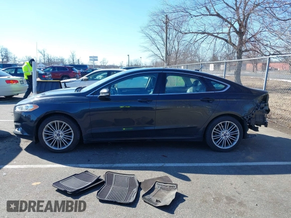 2013 Ford Fusion SE with VIN 3FA6P0HR2DR191084, listed as a IAAI auction lot 41640526 with 56,868 mi miles and . Bid and sale history available at DreamBid. Image 14.