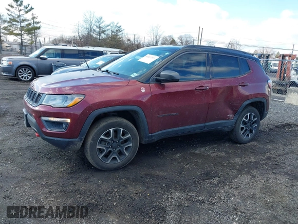 2020 Jeep Compass Trailhawk with VIN 3C4NJDDB2LT239384, listed as a IAAI auction lot 41527372 with 56,122 mi miles and . Bid and sale history available at carsss.com. Image 17.