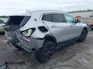 2022 BMW X2 sDrive28i z VIN WBXYH9C09N5T71828, wystawiony jako IAAI lot #40536245 z przebiegiem 36 012 mil mil oraz . Historia ofert i sprzedaży dostępna na DreamBid. Obrazek 4.
