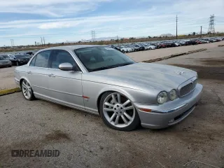 2004 Jaguar XJ with VIN SAJWA73B14TG24590, listed as a Copart auction lot 48438705 with 197,113 mi miles and Clean Title. Bid and sale history available at carsss.com. Image 4.