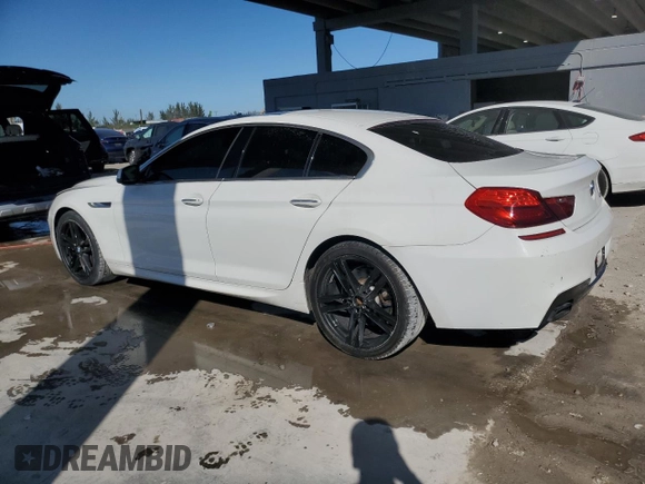 2013 BMW 6 Series 650i with VIN WBA6B2C52DD128713, listed as a Copart auction lot 47415235 with 123,575 mi miles and Clean Title. Bid and sale history available at DreamBid. Image 2.