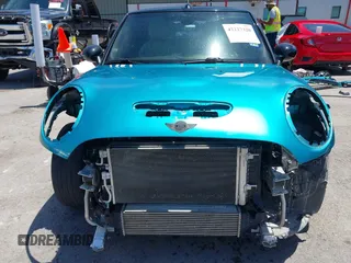2017 MINI Convertible Cooper S z VIN WMWWG9C30H3C80917, wystawiony jako IAAI lot #42227320 z przebiegiem 38 490 mil mil oraz . Historia ofert i sprzedaży dostępna na DreamBid. Obrazek 13.