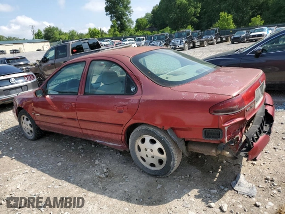2000 Mercury Mystique GS with VIN 1MEFM6530YK615859, listed as a Copart auction lot 59704875 with 259,272 mi miles and Salvage title. Bid and sale history available at DreamBid. Image 2.