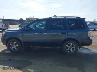 2006 Honda Pilot EX-L with VIN 5FNYF28546B015821, listed as a IAAI auction lot 41529408 with 145,209 mi miles. Bid and sale history available at carsss.com. Image 14.