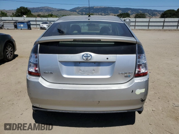 2004 Toyota Prius with VIN JTDKB20U240047067, listed as a Copart auction lot 56230125 with 164,662 mi miles and Salvage Title. Bid and sale history available at DreamBid. Image 6.