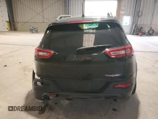 2016 Jeep Cherokee Trailhawk with VIN 1C4PJMBS4GW267375, listed as a Copart auction lot 58476005 with 116,151 mi miles and Salvage title. Bid and sale history available at DreamBid. Image 6.