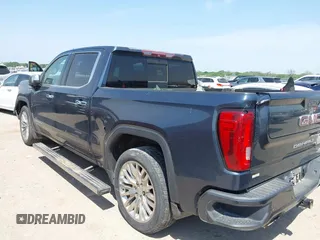 2019 GMC Sierra 1500 Denali z VIN 1GTU9FEL5KZ387012, wystawiony jako IAAI lot #42002743 z przebiegiem 124 718 mil mil oraz . Historia ofert i sprzedaży dostępna na DreamBid. Obrazek 3.