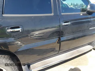 2004 Cadillac Escalade z VIN 1GYEC63T94R235191, wystawiony jako IAAI lot #42314704 z przebiegiem 164 935 mil mil oraz . Historia ofert i sprzedaży dostępna na DreamBid. Obrazek 14.