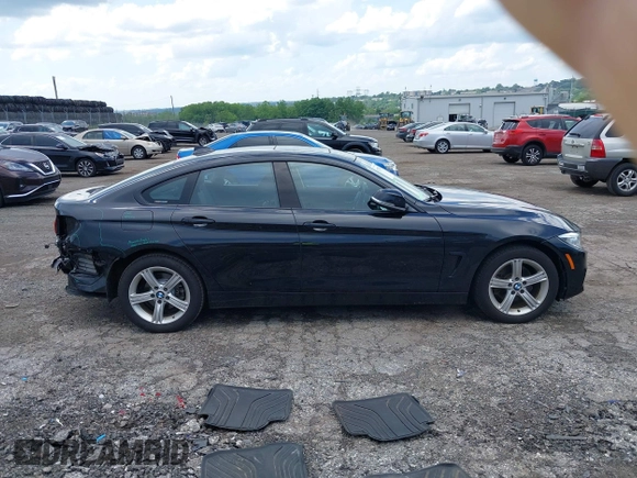 2015 BMW 4 Series 428i xDrive with VIN WBA4C9C52FD331620, listed as a IAAI auction lot 42556526 with 115,674 mi miles and . Bid and sale history available at DreamBid. Image 14.