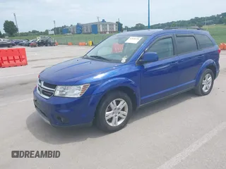 2012 Dodge Journey SXT with VIN 3C4PDCBB0CT323362, listed as a IAAI auction lot 42528338 with 187,995 mi miles and . Bid and sale history available at DreamBid. Image 2.