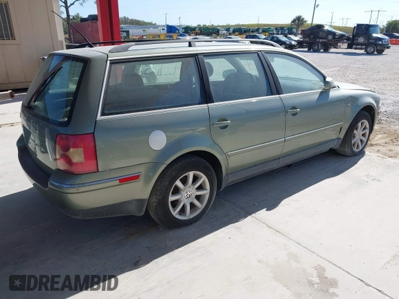 2004 Volkswagen Passat GLS z VIN WVWVD63BX4E011218, wystawiony jako IAAI lot #41308619 z przebiegiem 178 579 mil mil oraz . Historia ofert i sprzedaży dostępna na DreamBid. Obrazek 4.
