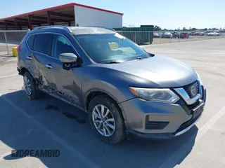 2017 Nissan Rogue SV with VIN KNMAT2MT9HP581822, listed as a IAAI auction lot 42140794 with 74,261 mi miles. Bid and sale history available at carsss.com. Image 1.
