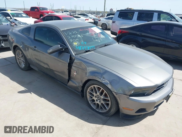2012 Ford Mustang Premium with VIN 1ZVBP8AM5C5275503, listed as a IAAI auction lot 41732075 with 176,990 mi miles and . Bid and sale history available at DreamBid. Image 1.