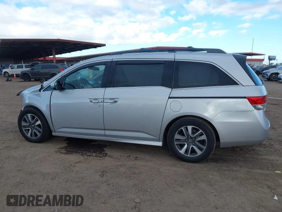 2014 Honda Odyssey Touring with VIN 5FNRL5H93EB066162, listed as a IAAI auction lot 41734783 with 173,063 mi miles and . Bid and sale history available at DreamBid. Image 14.