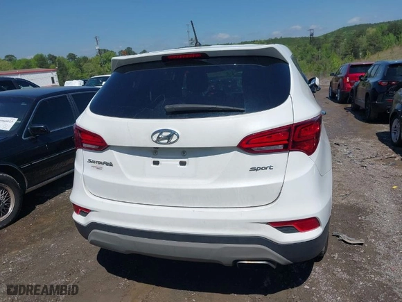 2018 Hyundai Santa Fe Sport 2.4L with VIN 5NMZT3LB7JH091203, listed as a IAAI auction lot 41983942 with 124,285 mi miles. Bid and sale history available at carsss.com. Image 16.
