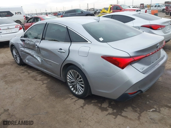 2019 Toyota Avalon Hybrid Limited with VIN 4T1B21FB2KU005306, listed as a IAAI auction lot 41586866 with 90,543 mi miles. Bid and sale history available at carsss.com. Image 3.