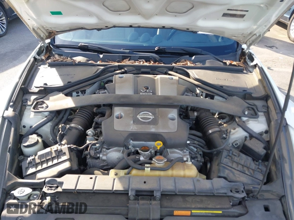 2013 Nissan 370Z z VIN JN1AZ4EH4DM380820, wystawiony jako IAAI lot #41547638 z przebiegiem 118 222 mil mil oraz . Historia ofert i sprzedaży dostępna na DreamBid. Obrazek 10.