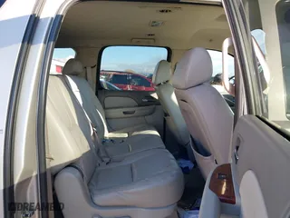 2009 Chevrolet Suburban LT w/2LT with VIN 1GNFC26099R177554, listed as a IAAI auction lot 38664519 with 311,063 mi miles. Bid and sale history available at carsss.com. Image 8.