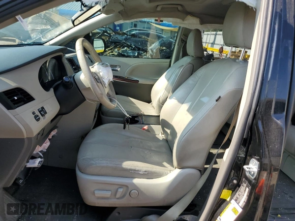 2012 Toyota Sienna XLE AAS with VIN 5TDYK3DC6CS211062, listed as a Copart auction lot 59404205 with Not provided miles and Salvage title. Bid and sale history available at DreamBid. Image 7.
