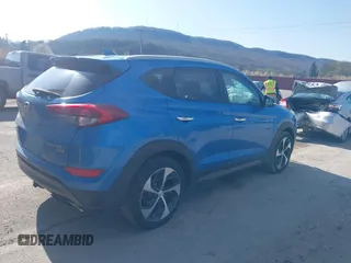 2016 Hyundai Tucson Eco with VIN KM8J3CA24GU054350, listed as a IAAI auction lot 41983769 with 132,424 mi miles. Bid and sale history available at carsss.com. Image 4.