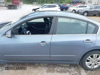 2010 Nissan Altima S with VIN 1N4AL2AP7AN493074, listed as a IAAI auction lot 42065457 with 178,923 mi miles and . Bid and sale history available at DreamBid. Image 14.