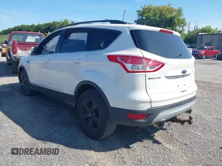 2013 Ford Escape SE with VIN 1FMCU9GXXDUB66562, listed as a IAAI auction lot 40287024 with 120,398 mi miles. Bid and sale history available at carsss.com. Image 3.