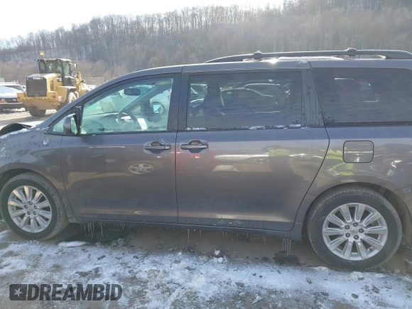 2013 Toyota Sienna LE with VIN 5TDJK3DC8DS056730, listed as a IAAI auction lot 41141247 with 166,579 mi miles and . Bid and sale history available at DreamBid. Image 14.