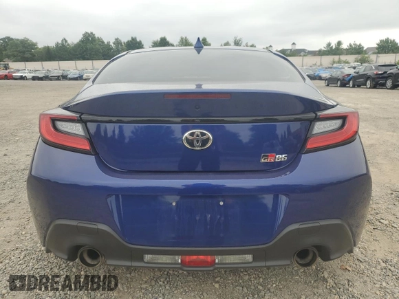 2023 Toyota GR86 with VIN JF1ZNBB19P9758747, listed as a Copart auction lot 70958554 with 22,573 mi miles and Salvage Title. Bid and sale history available at carsss.com. Image 6.