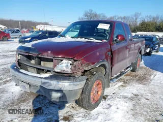 2003 Ford F-150 XL with VIN 1FTRX18L33NB00026, listed as a IAAI auction lot 41608554 with 161,877 mi miles. Bid and sale history available at carsss.com. Image 6.